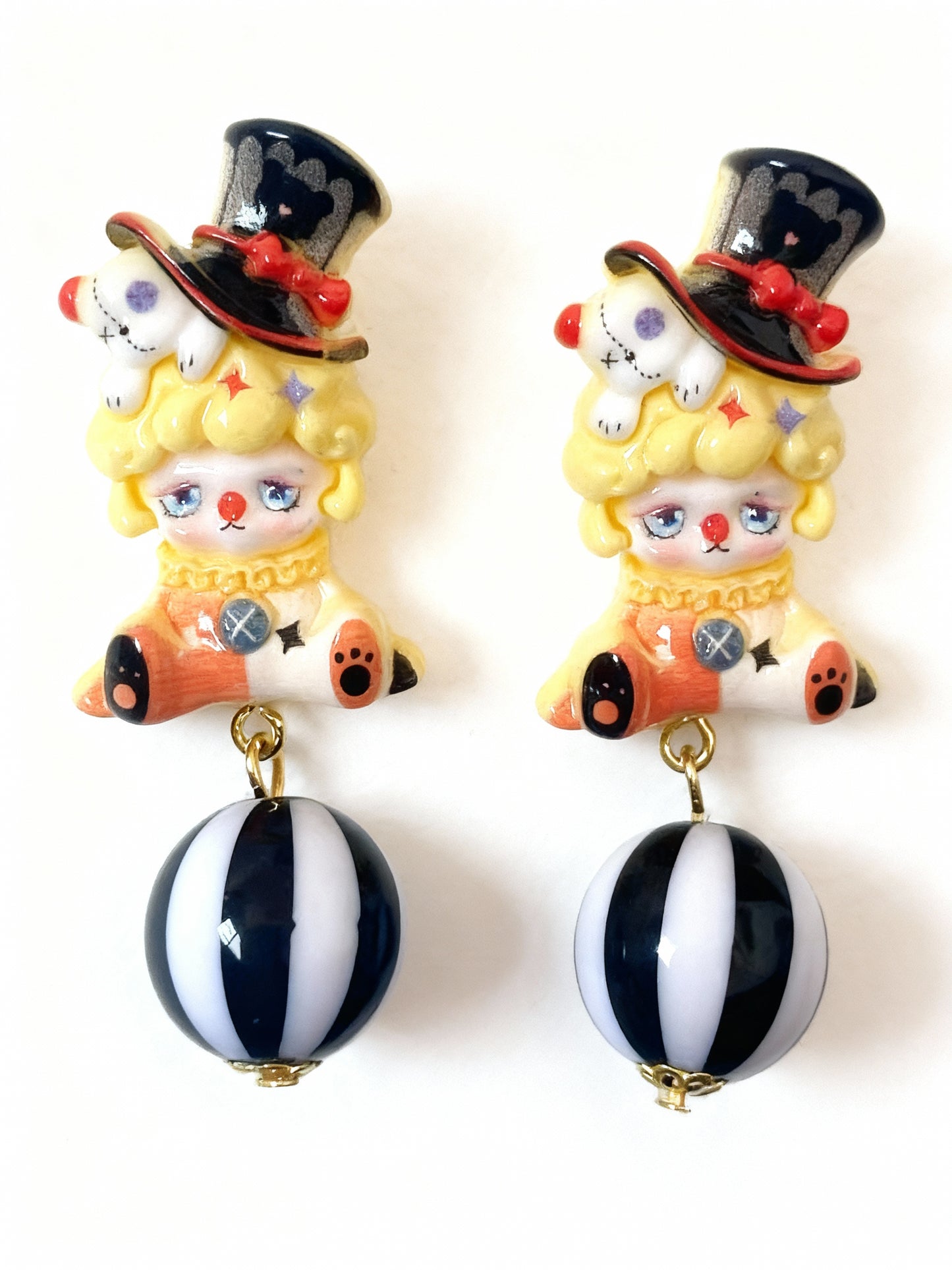 The twin clown earrings